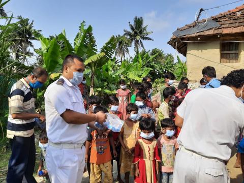 Service-Service-Camp-for-awareness-and-distribution-of-sanitizer-and-masks-in-Sagar-Island-West-bangal